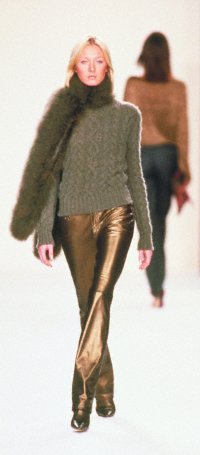 Gold leather jean with a green cashmere cable crewneck and a bronze maribou boa from Ralph Lauren