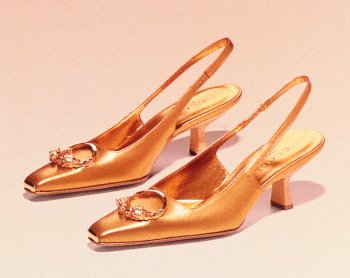 Mid-heel slingback with tiger ornament from

Gucci