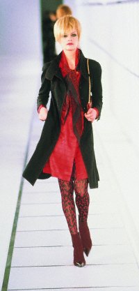 Navy wool jacket over a red silk shirtdress from Chanel