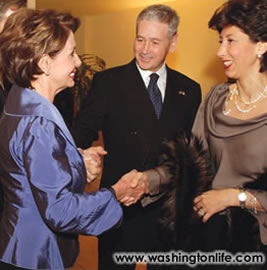 Speaker Nancy Pelosi is greeted by Italian Ambassador Giovanni Castellaneta and his wife Lila at the Italian Embassy during a dinner held in Pelosi's honor 