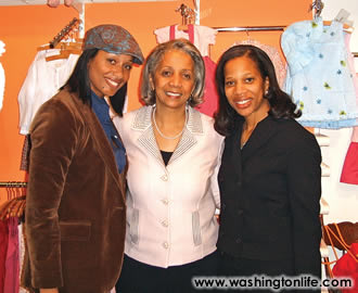 KEISHA BOOTH, JOANN BROWNING and CHARRISSE JACKSON JORDAN at a champagne reception at children's boutique Yiro on April 11th.
