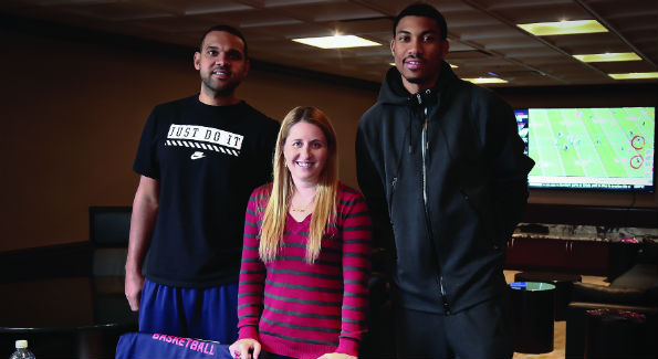 Jared Dudley, Laura Wainman and Otto Porter Jr. in the Verizon Center's Player's Lounge. (Photo by Tony Powell) 