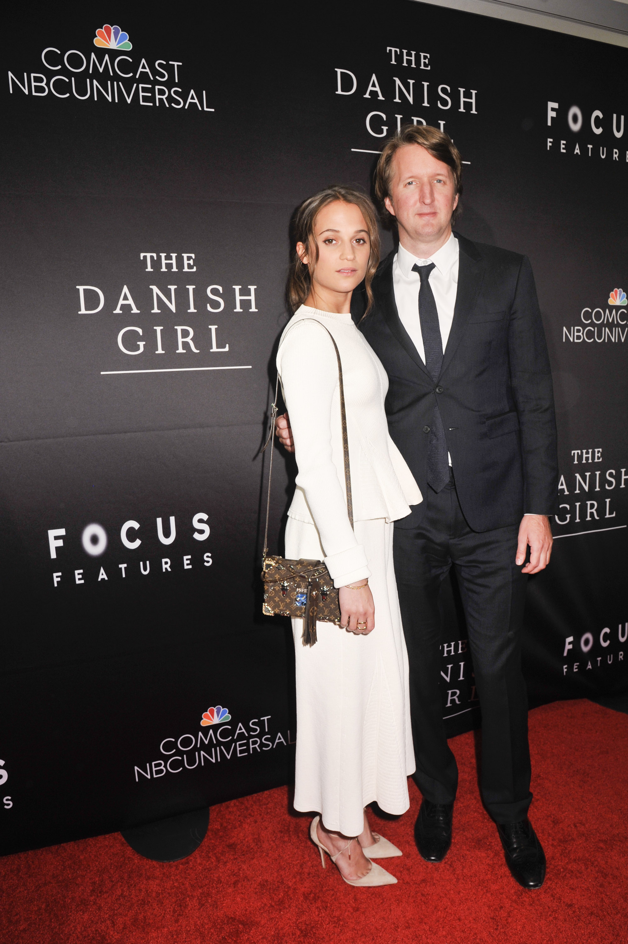Alicia Vikander, actress, The Danish Girl; Tom Hooper, director, The Danish Girl, attend the DC premiere of Focus Features' "THE DANISH GIRL" at the United States Navy Memorial in Washington DC on November 23, 2015. (Photo by Kris Connor for Focus Features)