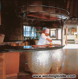 Safran, an Indian restaurant, unfolds around an open kitchen and tandori ovens