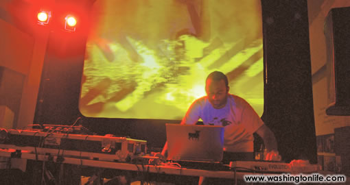 MOSSA performing. Clandestine & Les Passagers provided the projection.