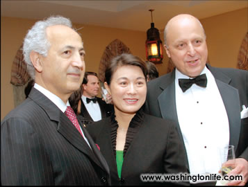 Iraqi Amb. Samir Sumaidaie and his wife Mai with John Negroponte