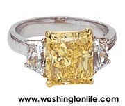 FINK’S -CARAT RADIANT INTENSE YELLOW CANARY DIAMOND WITH TRAPEZOID SIDES