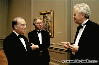 Robert G. Liberatore, Thomas Sidlik, Philip Conisbee in front of Paul Cézanne’s Peasant in a Blue Smock