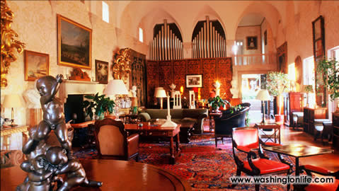 The ballroom is filled with antique pieces including the main attraction, a 1920s organ originally intended for Hillandales Tuscon villa-inspired ballroom.