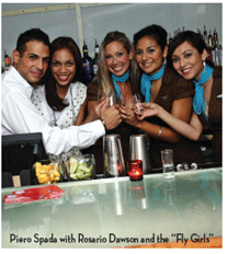 Piero Spada with Rosario Dawson and the “Fly Girls”